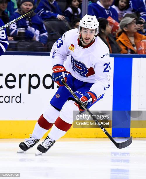 Niki Petti of the Laval Rocket turns up ice against the Toronto Marlies during AHL game action on March 12, 2018 at Air Canada Centre in Toronto,...