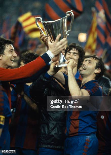 Quini , the scorer of Barcelona's winning goal, holds the trophy with goalkeeper Javier Urruti after the European Cup Winners Cup Final against...