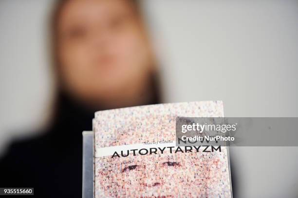 The book Neo Authoritarianism with de facto Polish leader Jaroslaw Kaczynski by writer and sociologist Maciej Gdula is seen at the presentation of...