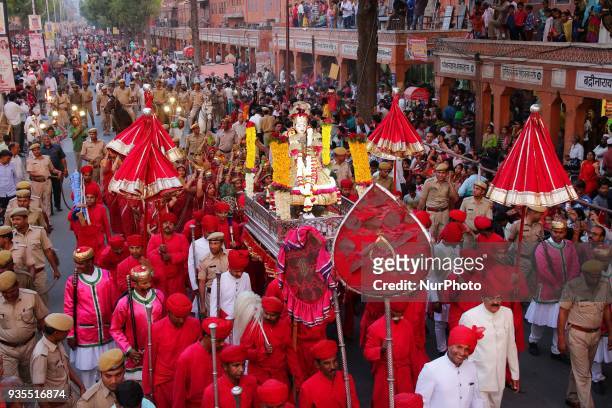 Traditional Gangaur procession makes way through Tripolia Gate on the occasion of Gangaur Festival in Jaipur, Rajasthan, India on 20 March, 2018.