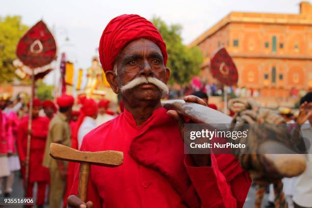 Traditional Gangaur procession makes way through Tripolia Gate on the occasion of Gangaur Festival in Jaipur, Rajasthan, India on 20 March, 2018.