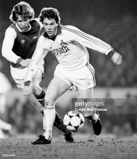 Cologne's Tony Woodcock is chased by Arsenal's Willie Young during their Friendly match held at Highbury, London in January 1981. Arsenal beat...