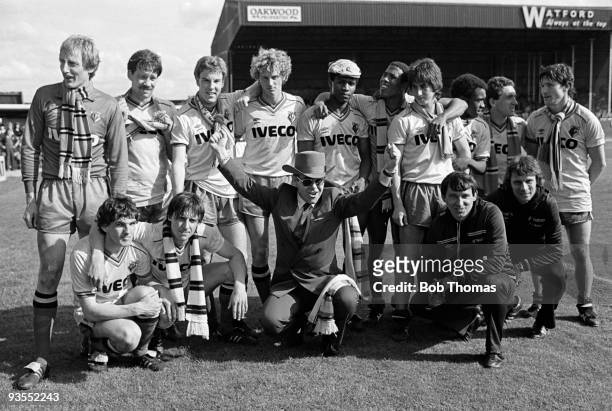 The victorious Watford team at the end of the season celebrate finishing second in Division 1 with chairman Elton John after beating Liverpool 2-1 at...