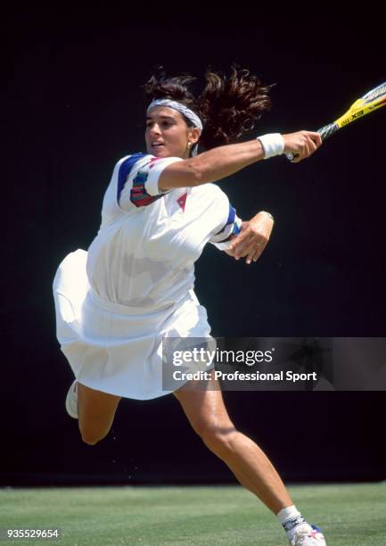 Gabriela Sabatini of Argentina in action during the Wimbledon Lawn Tennis Championships at the All England Lawn Tennis and Croquet Club, circa June,...