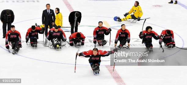 Japanese players applaud after classigication game 7/8th on day seven of the PyeongChang 2018 Paralympic Games on March 16, 2018 in Pyeongchang-gun,...