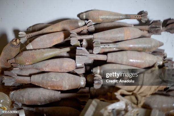 Ammunitions are seen after Turkish military and Free Syrian Army uncover ammunition depot as the search operations continue after Turkish Armed...