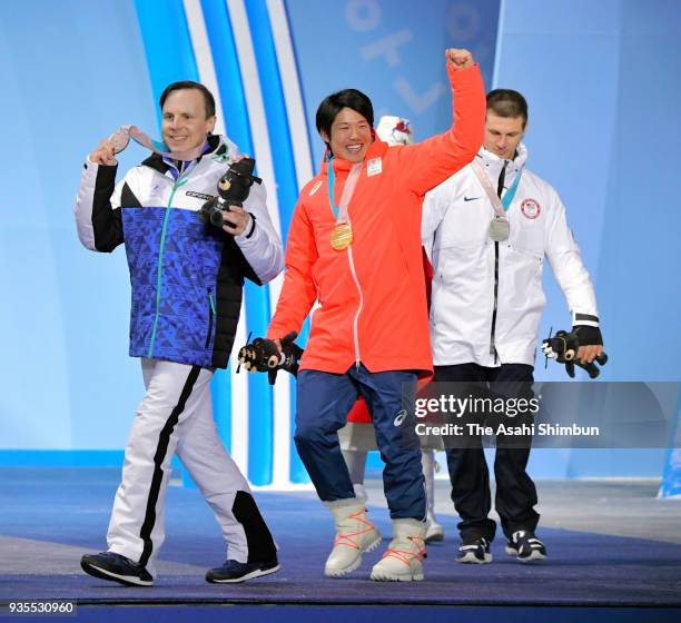 Gold medallist Gurimu Narita of Japan , Silver medallist Evan Strong of USA and Bronze medallist Matti Suur-Hamari of Finland competes in the Men's...