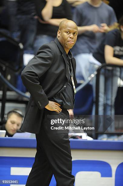 Craig Robinson, head coach of the Oregon State Beavers, looks on during a college basketball game against the George Washington Colonials on November...