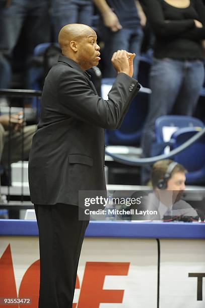 Craig Robinosn, head coach of the Oregon State Beavers, calls a play during a college basketball game against the George Washington Colonials on...