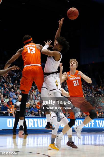 Paschal Chukwu of the Syracuse Orange blocks a shot by Remy Martin of the Arizona State Sun Devils during the game at UD Arena on March 14, 2018 in...