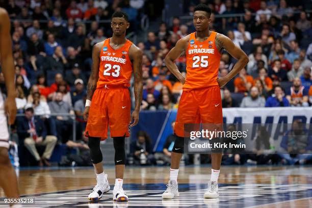 Frank Howard of the Syracuse Orange and Tyus Battle of the Syracuse Orange rest during a stoppage in play in the game against the Arizona State Sun...