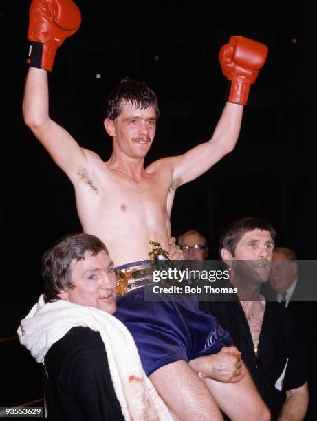 Robert Dickie of Great Britain wearing the Lonsdale belt after his victory on points over John Feeney of Great Britain for the British Featherweight...