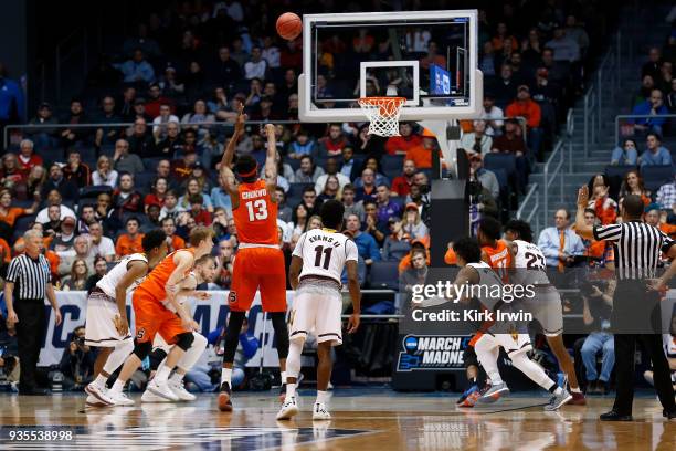 Paschal Chukwu of the Syracuse Orange shoots a free throw during the game against the Arizona State Sun Devils at UD Arena on March 14, 2018 in...