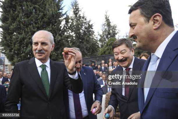 Turkish Culture and Tourism Minister Numan Kurtulmus and Secretary General of the International Organization of Turkic Culture Dusen Kaseinov knock...