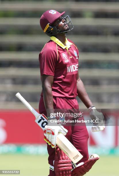 Jason Holder of the West Indies walks off after losing his wicket during The ICC Cricket World Cup Qualifier between the West Indies and Scotland at...