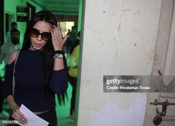 Model Rozlyn Khan came at Thane Crime Branch office for the recorded statements of call detail records [CDR] case, on March 20, 2018 in Mumbai,...