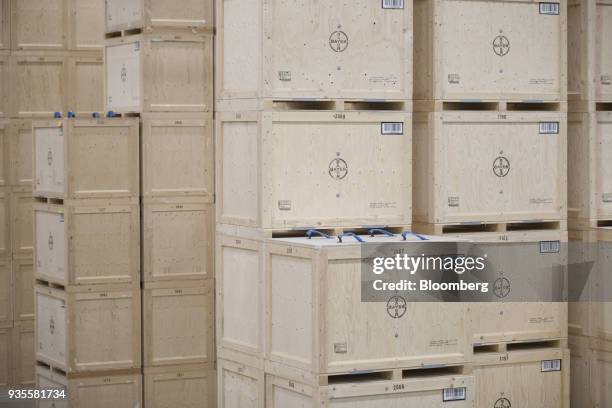 Crates of rapeseed stand stacked inside the Bayer CropScience AG processing facility in Monheim, Germany, on Wednesday, March 21, 2018. Bayer cleared...