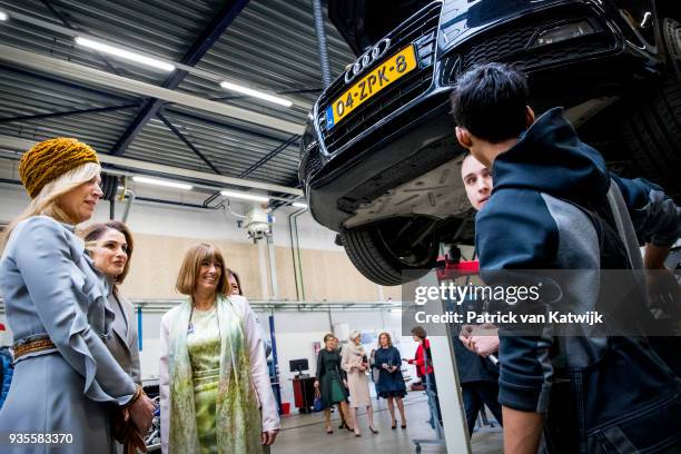 Queen Rania of Jordan and Queen Maxima of The Netherlands visit the ROC Mondriaan technical school on March 21, 2018 in The Hague, Netherlands.