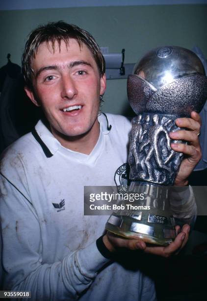 Gary Owen of England holds the trophy in the dressing room after the UEFA Under-21 Championship Final, 2nd leg, held at Weser Stadium, Bremen,...