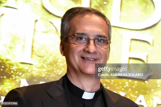 This photo taken on October 13, 2017 shows Dario Edoardo Vigano, Vatican's Secretariat for Communications prefect, looking on during a press...