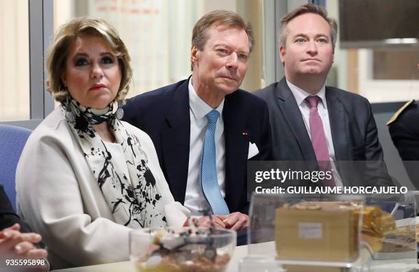 Grand Duke Henri of Luxembourg , Grand Duchess Maria-Teresa and French Junior Minister for Foreign Affairs Jean-Baptiste Lemoyne visit the National...