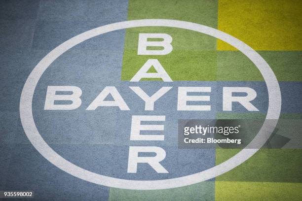 Logo sits on display at the Bayer CropScience AG facility in Monheim, Germany, on Wednesday, March 21, 2018. Bayer cleared one big hurdle for its $66...