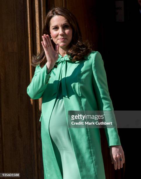 Catherine, Duchess of Cambridge leaves after convening an early intervention for children and families symposium at Royal Society of Medicine on...