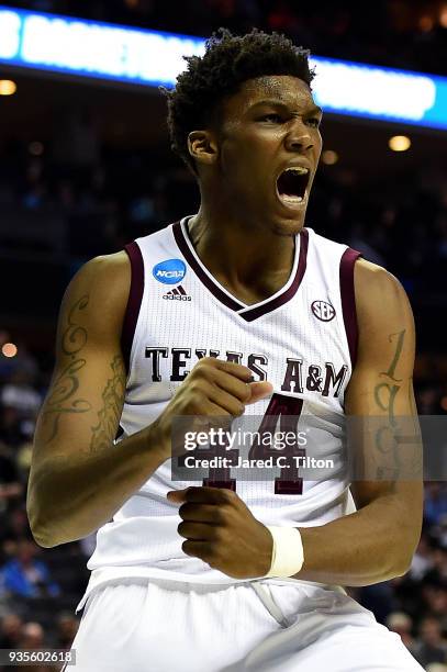 Robert Williams of the Texas A&M Aggies reacts after a dunk against the Providence Friars during the first round of the 2018 NCAA Men's Basketball...
