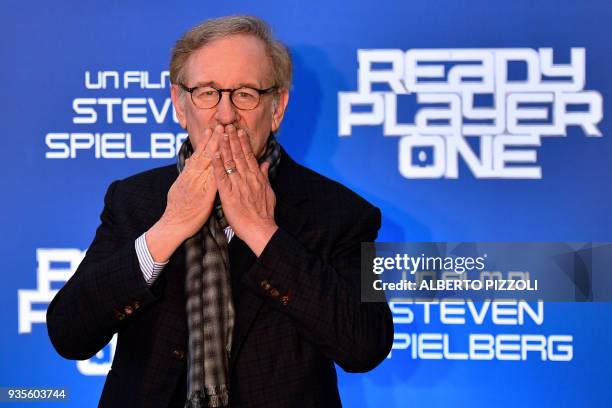 Director Steven Spielberg blows kisses as he poses during a photocall ahead of the premiere of his last movie "Ready Player One" on March 21, 2018 in...