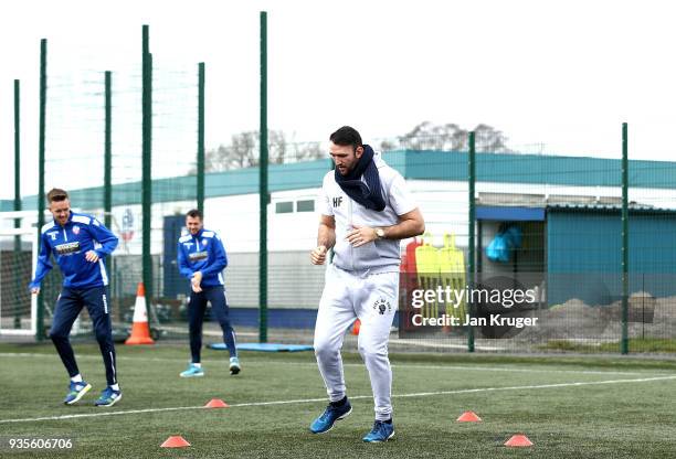 Hughie Fury trains with Bolton players during a media workout at Bolton Wanderers FC Academy on March 21, 2018 in Bolton, England.