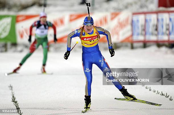 Sweden's Helena Jonsson competes on the way to win the Women 15km individual on December 2, 2009 in Ostersund. Jonsson won the race ahead of Sweden's...