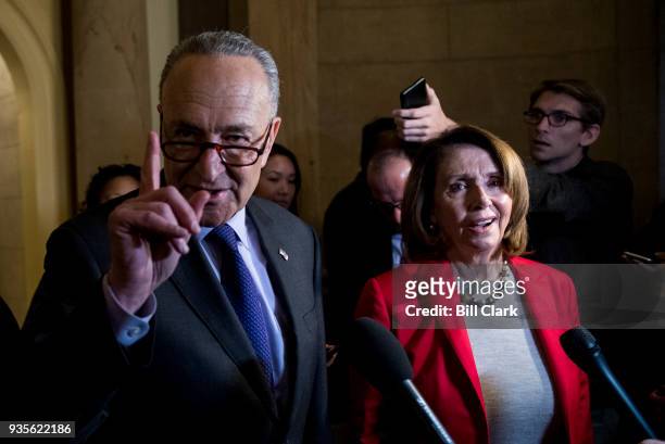 Senate Minority Leader Chuck Schumer, D-N.Y., and House Minority Leader Nancy Pelosi, D-Calif., speak to reporters following a meeting of House and...