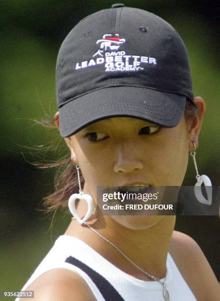 Portrait de la jeune joueuse américaine Michelle Wie, pris le 24 juillet 2004 à Evian, lors de la dernère journée du tournoi de golf "Evian Masters"....