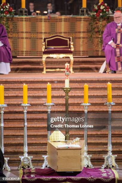 Bishop Peter Kohlgraf preaches during the funeral service for Cardinal Karl Lehmann while the coffin of Cardinal Karl Lehmann stands in front of the...