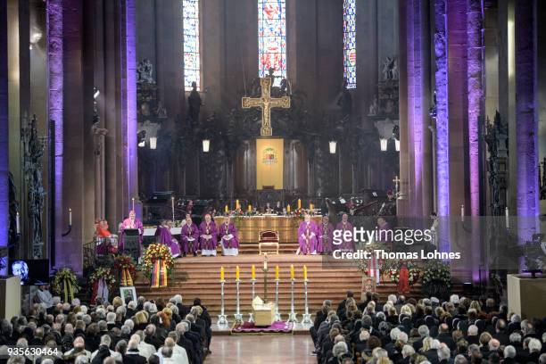 Bishop Peter Kohlgraf preaches during the funeral service for Cardinal Karl Lehmann while the coffin of Cardinal Karl Lehmann stands in front of the...