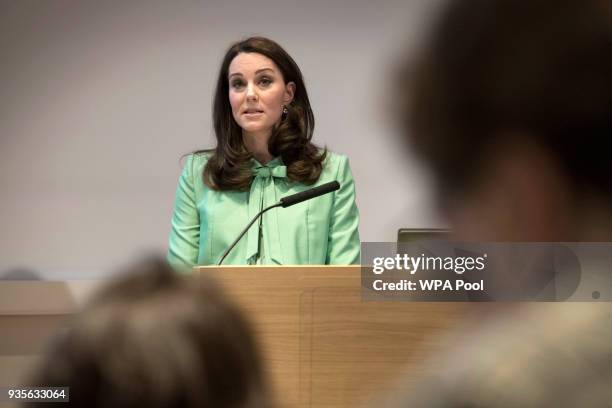 Catherine, Duchess of Cambridge speaks at a symposium she has organised on early intervention for children and families with The Royal Foundation at...