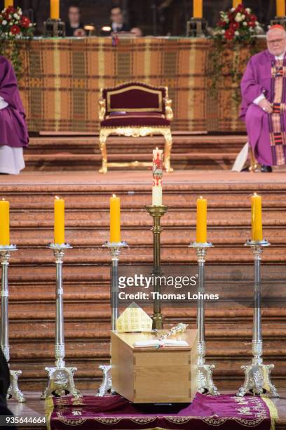 Bishop Peter Kohlgraf preaches during the funeral service for Cardinal Karl Lehmann while the coffin of Cardinal Karl Lehmann stands in front of the...