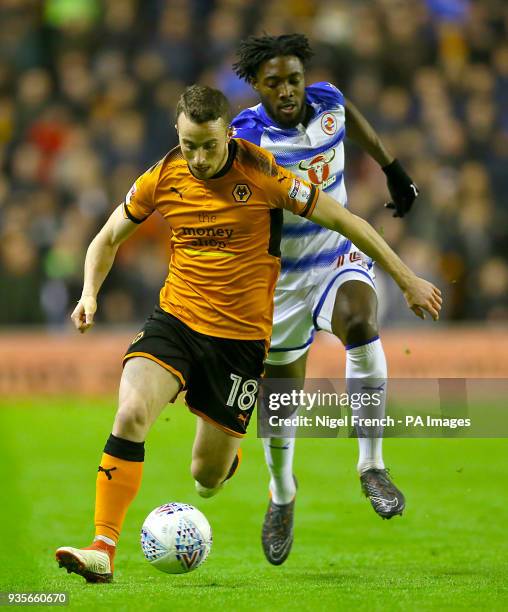 Wolverhampton Wanderers' Diogo Jota and Reading's one Aluko battle for the ball