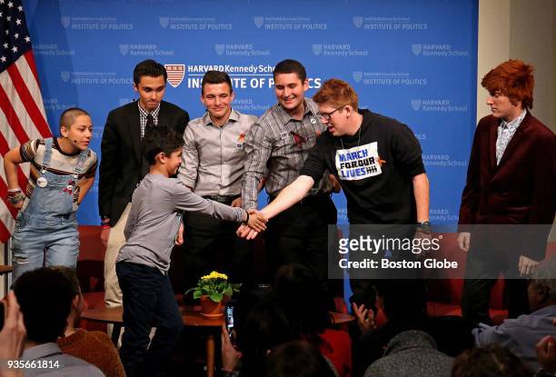 Nine-year-old Noah King, from Belmont, meets the panel after asking a question during the Q&A session at a panel of students from Parkland, FL's...
