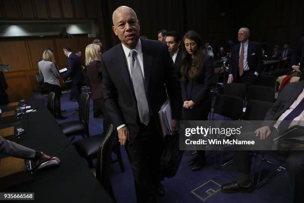 Former Homeland Security Secretary Jeh Johnson departs after testifying before the Senate Intelligence Committee March 21, 2018 in Washington, DC....