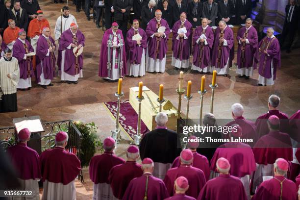 Cardinals, Bishops and priest stand around the coffin of Cardinal Karl Lehmann during the funeral service for Lehmann in the Mainzer Dom cathedral on...