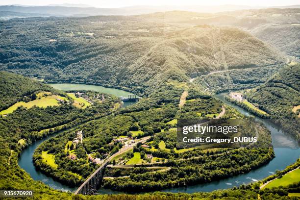 aerial view of french ain river valley in horseshoe shape with beautiful old stone viaduct of cize-bolozon in bugey mountains - rhone alpes stock pictures, royalty-free photos & images