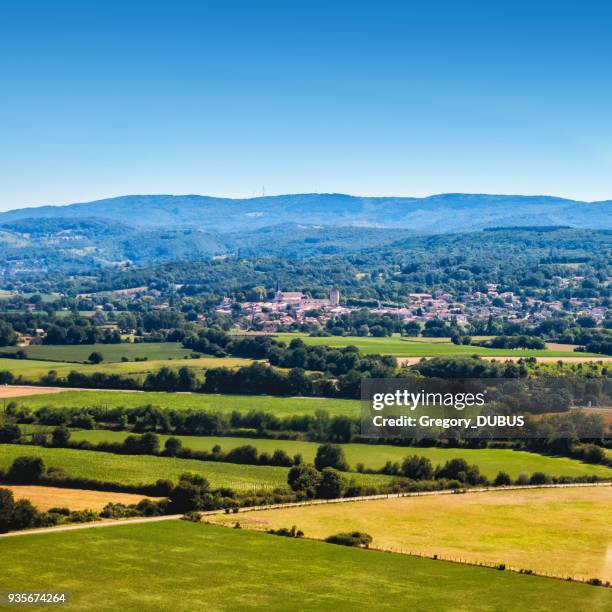 aerial view of french ambronay village in middle of ain lush foliage countryside in summer - france countryside stock pictures, royalty-free photos & images