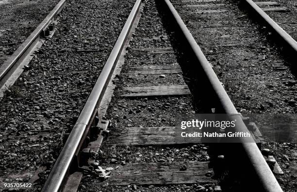 railroad tracks in perspective - ellensburg stock pictures, royalty-free photos & images