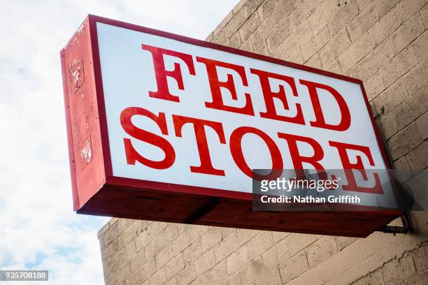 feed store sign - ellensburg stock pictures, royalty-free photos & images