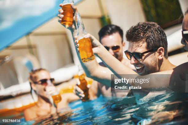 summer vibes. - friends poolside stock pictures, royalty-free photos & images