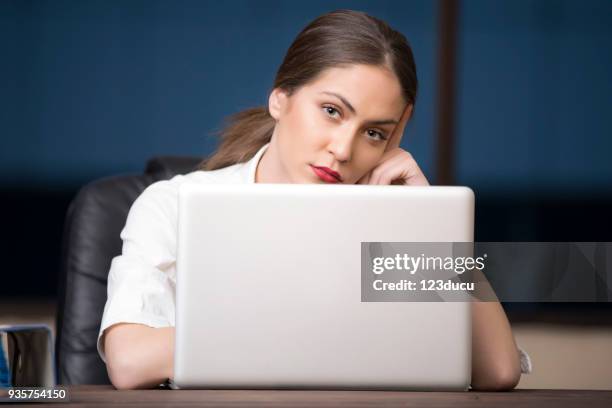 young woman working with laptop - 123ducu stock pictures, royalty-free photos & images