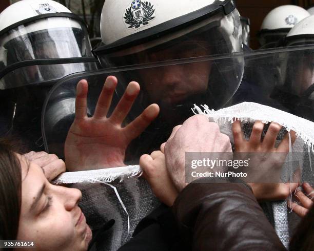 Protesters scuffled with riot police in Thessaloniki, Greece, on Wednesday 21 of March, where electronic auctions of foreclosed properties were...