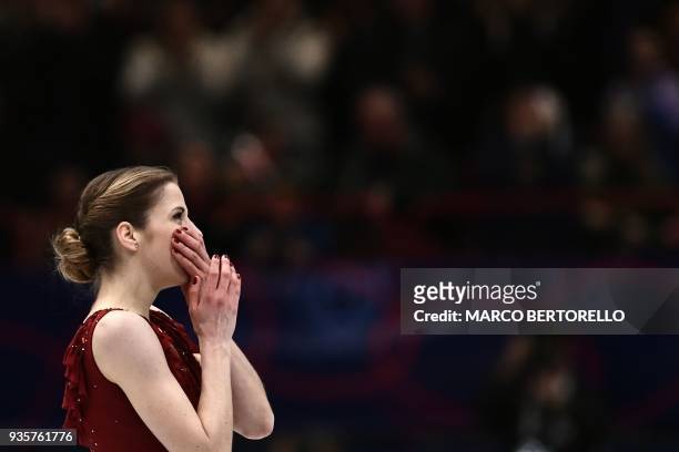Italy's Carolina Kostner reacts on March 21, 2018 in Milan during the Ladies figure skating short program at the Milano World Figure Skating...
