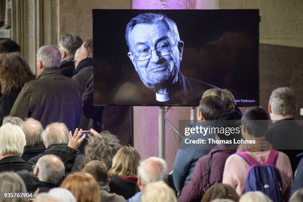 The picture of Cardinal Karl Lehmann is seen on a screen during the funeral service for him in the Mainzer Dom cathedral on March 21, 2018 in Mainz,...